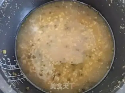 Make Rice oatmeal green bean congee step 7