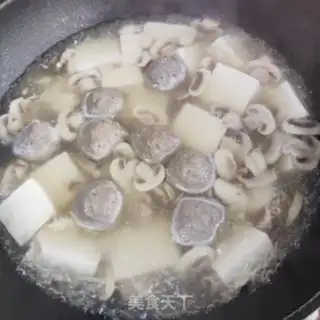 Make Meatball mushroom tofu soup step 7