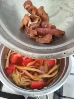 Make Soup with a yellow flower and tomatoes step 6