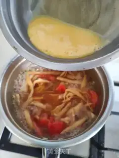 Make Soup with a yellow flower and tomatoes step 7