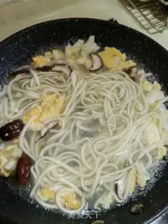 Make Egg mushroom noodles step 6