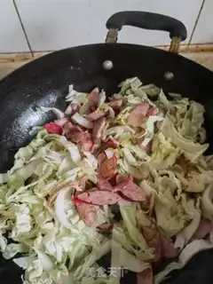 Make Cabbage with red sausage step 6
