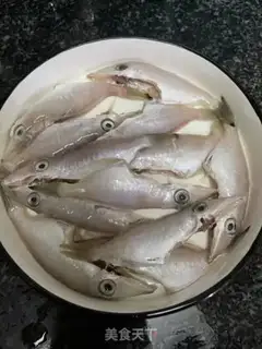 Make Dry squid and skin fish congee step 0