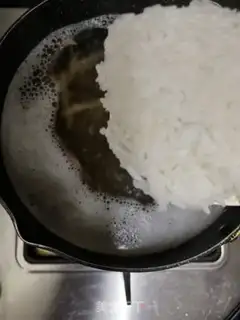 Make Dry squid and skin fish congee step 6