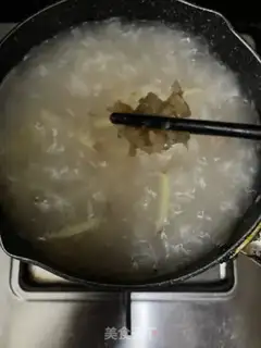 Make Dry squid and skin fish congee step 8