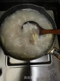 Make Dry squid and skin fish congee step 9