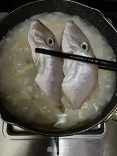 Make Dry squid and skin fish congee step 10