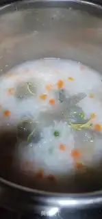 Make Pea carrot shrimp congee step 4