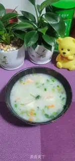 Make Pea carrot shrimp congee step 7