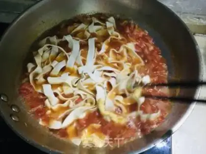 Make Tomato egg noodles step 12