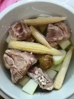Make Blue papaya corn and pigbone soup step 4