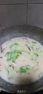 Make Porridge of raw chicken silk mushrooms step 8