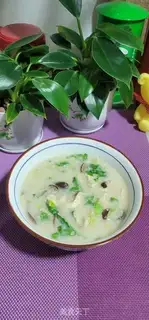 Make Porridge of raw chicken silk mushrooms step 10
