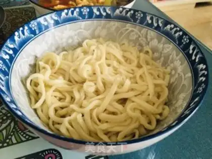 Make Spicy egg tomato noodles step 12