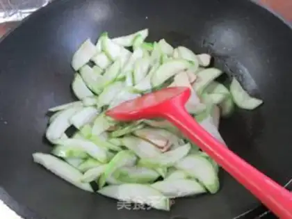 Make Scrambled carrots and silk melons step 5