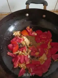 Make Tomato fried eggs step 5