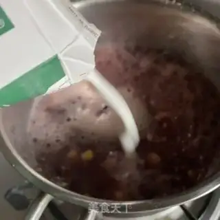 Make Five oatmeal milk corn congee step 4