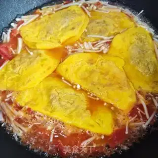 Make Tomato mushroom egg dumpling soup step 7