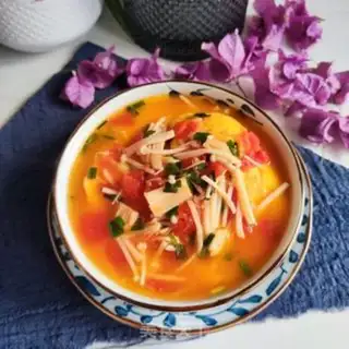 Make Tomato mushroom egg dumpling soup step 9