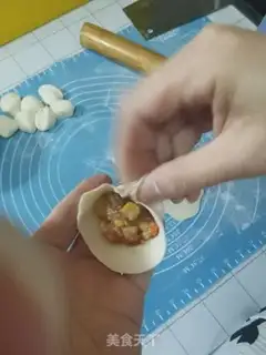 Make A dumpling pan and a bun step 16