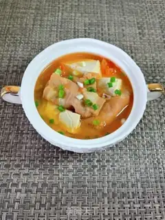 Make Tomato tofu fat cow soup step 9