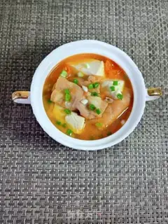 Make Tomato tofu fat cow soup step 10