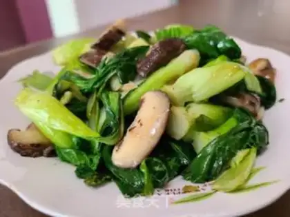 Make A green vegetable with mushrooms step 7