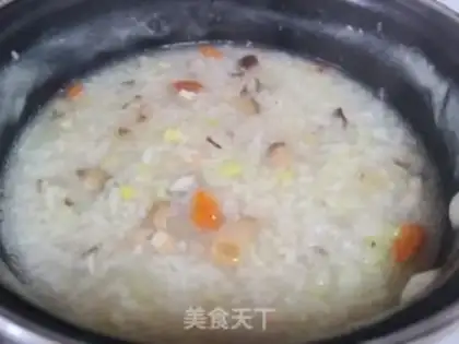 Make Celery mushroom congee step 10