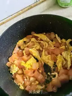 Make Tomato fried eggs step 7
