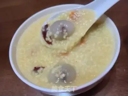 Make Little rice porridge with red dates step 7