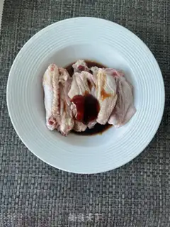 Make The chicken wings and potatoes step 1