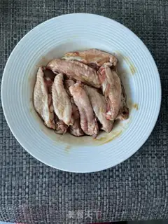 Make The chicken wings and potatoes step 2