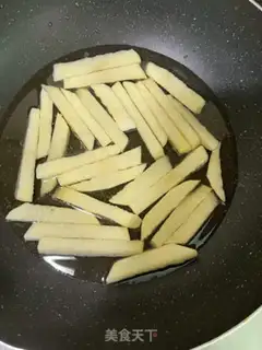 Make The chicken wings and potatoes step 4