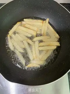 Make The chicken wings and potatoes step 5