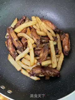 Make The chicken wings and potatoes step 9