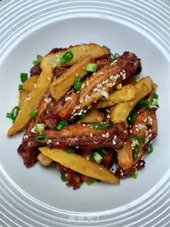 Make The chicken wings and potatoes step 14