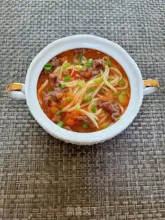 Make Tomato beef noodles step 16