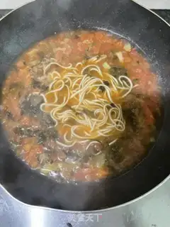 Make Ketchup beef noodles step 18