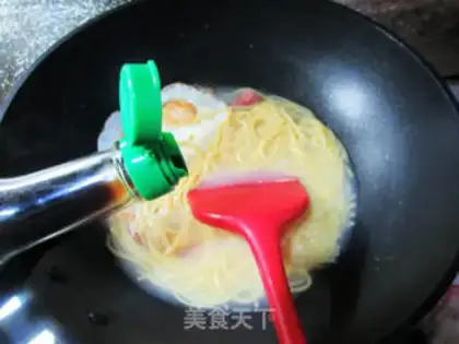 Make Egg sausage corn noodles step 7
