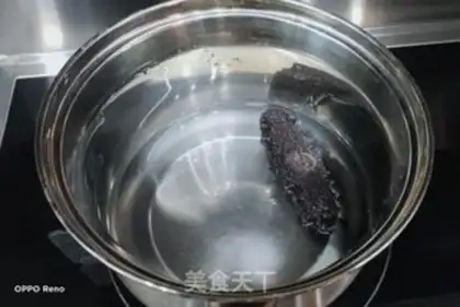 Make A little rice congee from the sea cucumber step 3