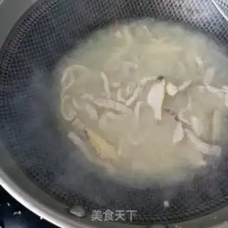 Make The abalone fried Dutch beans step 14