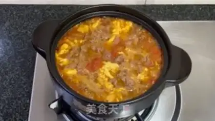 Make Tomato-egg beef pan step 15