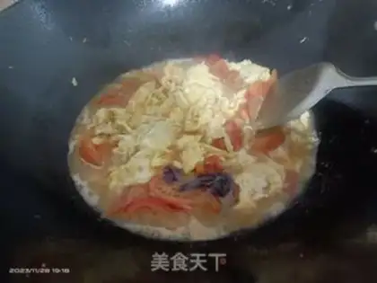Make Tomato fried eggs step 7