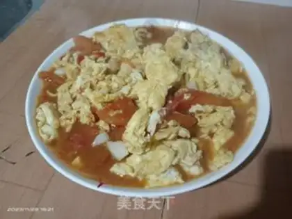 Make Tomato fried eggs step 9