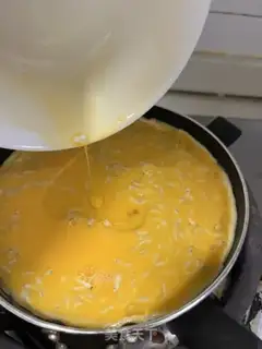 Make Silverfish with fried eggs step 4