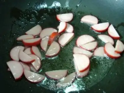 Make Red sausage fried eggs step 5
