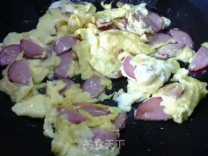 Make Red sausage fried eggs step 6