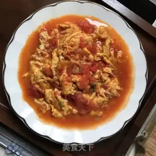 Make Tomato fried eggs step 7