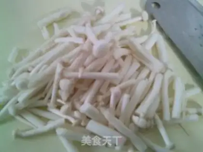 Make Seafood mushrooms, red intestines, tofu step 2