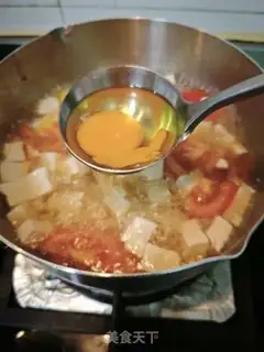 Make Tomato egg tofu soup step 5